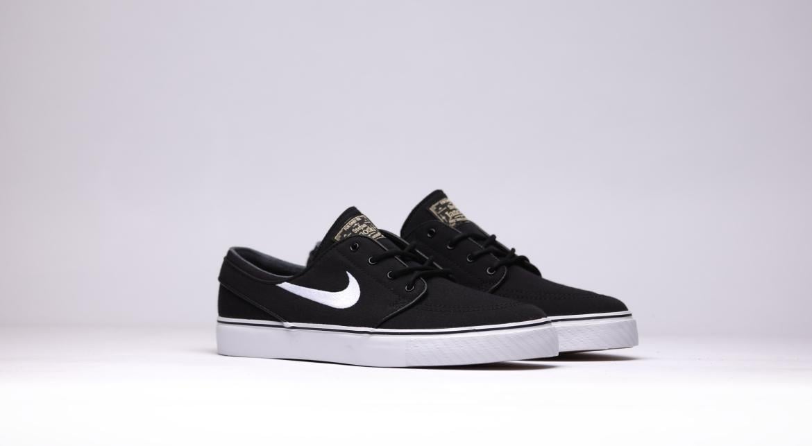 Nike sb janoski black and white canvas best sale